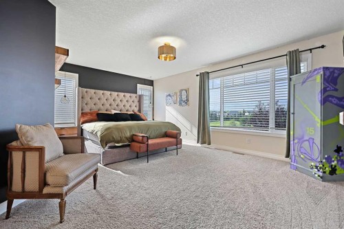739 Cimarron Close, Okotoks, AB - Indoor Photo Showing Bedroom