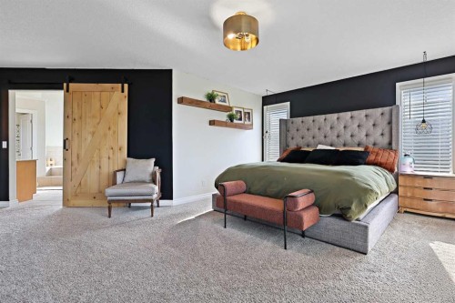 739 Cimarron Close, Okotoks, AB - Indoor Photo Showing Bedroom