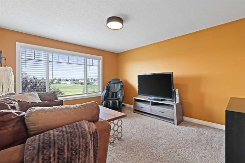 739 Cimarron Close, Okotoks, AB - Indoor Photo Showing Living Room