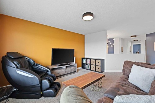 739 Cimarron Close, Okotoks, AB - Indoor Photo Showing Living Room