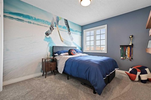 739 Cimarron Close, Okotoks, AB - Indoor Photo Showing Bedroom