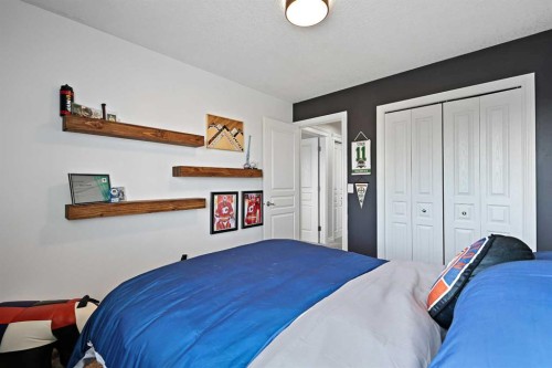 739 Cimarron Close, Okotoks, AB - Indoor Photo Showing Bedroom