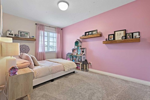 739 Cimarron Close, Okotoks, AB - Indoor Photo Showing Bedroom
