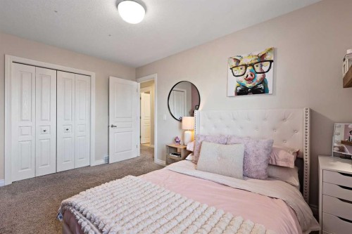 739 Cimarron Close, Okotoks, AB - Indoor Photo Showing Bedroom