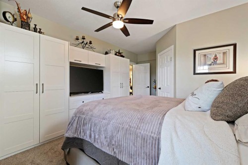 739 Cimarron Close, Okotoks, AB - Indoor Photo Showing Bedroom