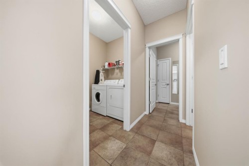 283 Springmere Link, Chestermere, AB - Indoor Photo Showing Laundry Room