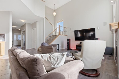 283 Springmere Link, Chestermere, AB - Indoor Photo Showing Living Room