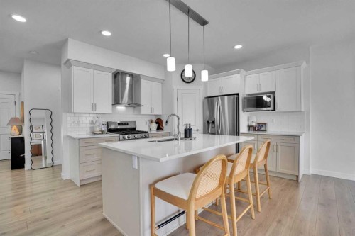 58 Ranchers View, Okotoks, AB - Indoor Photo Showing Kitchen With Upgraded Kitchen