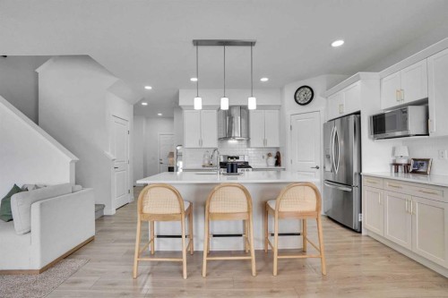58 Ranchers View, Okotoks, AB - Indoor Photo Showing Kitchen With Upgraded Kitchen