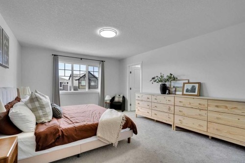58 Ranchers View, Okotoks, AB - Indoor Photo Showing Bedroom