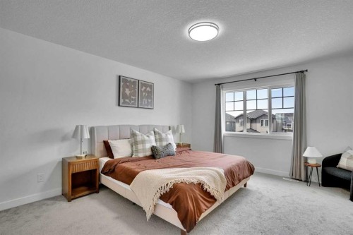 58 Ranchers View, Okotoks, AB - Indoor Photo Showing Bedroom