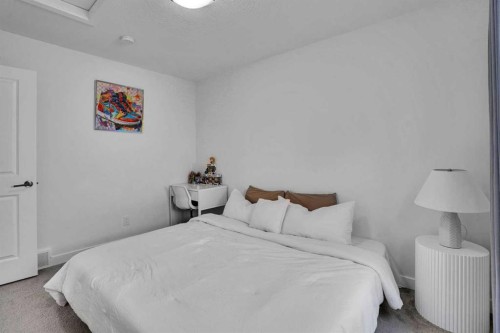 58 Ranchers View, Okotoks, AB - Indoor Photo Showing Bedroom