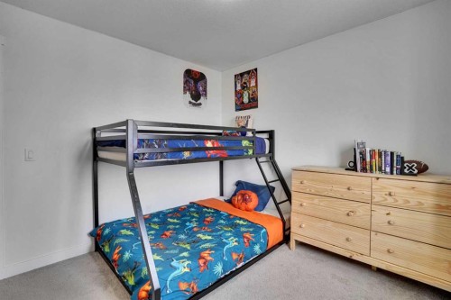 58 Ranchers View, Okotoks, AB - Indoor Photo Showing Bedroom