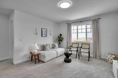 58 Ranchers View, Okotoks, AB - Indoor Photo Showing Living Room