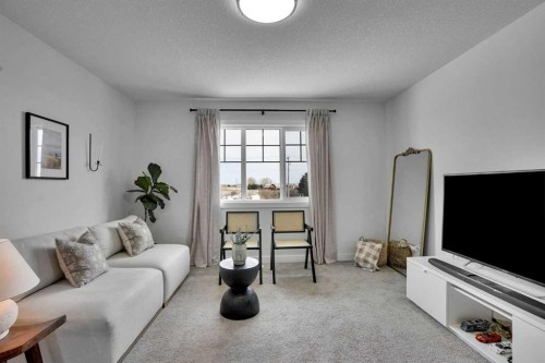 58 Ranchers View, Okotoks, AB - Indoor Photo Showing Living Room