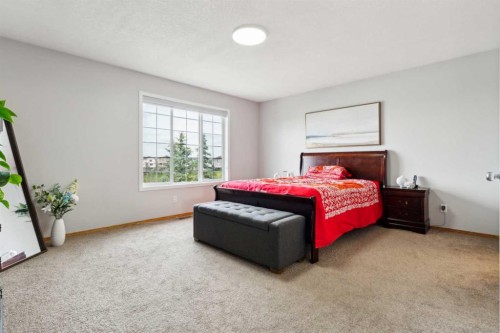 292 Taracove Estate Drive Ne, Calgary, AB - Indoor Photo Showing Bedroom