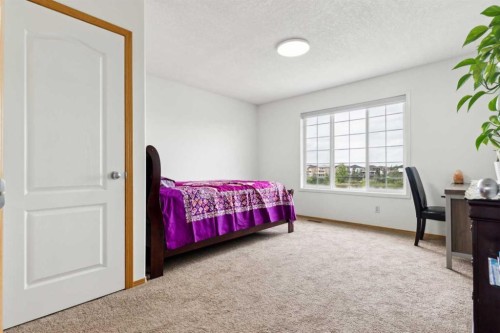 292 Taracove Estate Drive Ne, Calgary, AB - Indoor Photo Showing Bedroom