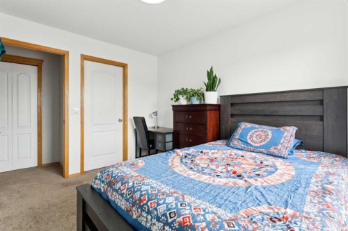 292 Taracove Estate Drive Ne, Calgary, AB - Indoor Photo Showing Bedroom