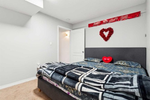 292 Taracove Estate Drive Ne, Calgary, AB - Indoor Photo Showing Bedroom