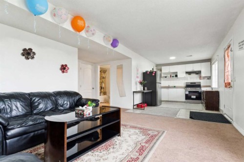 292 Taracove Estate Drive Ne, Calgary, AB - Indoor Photo Showing Living Room