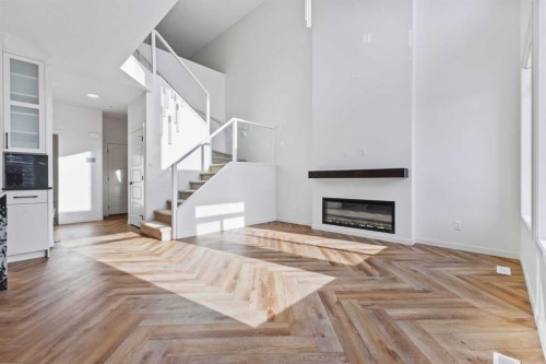 229 Calhoun Crescent Ne, Calgary, AB - Indoor Photo Showing Living Room With Fireplace