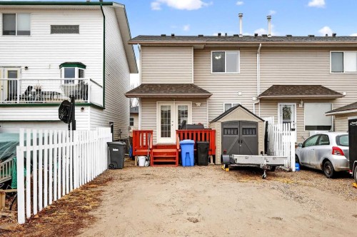 42F Green Meadow Crescent, Strathmore, AB - Outdoor With Deck Patio Veranda With Exterior