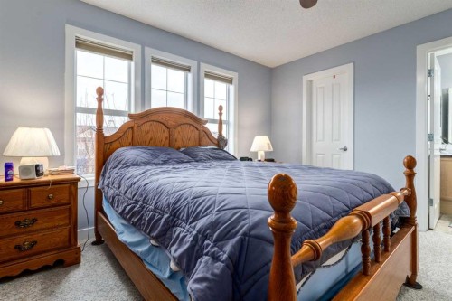 216 Silverado Range Close Sw, Calgary, AB - Indoor Photo Showing Bedroom