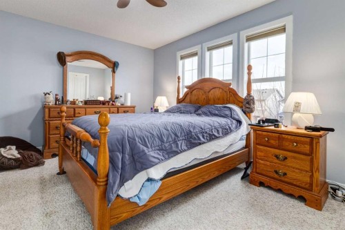 216 Silverado Range Close Sw, Calgary, AB - Indoor Photo Showing Bedroom