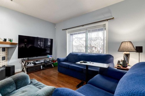 216 Silverado Range Close Sw, Calgary, AB - Indoor Photo Showing Living Room