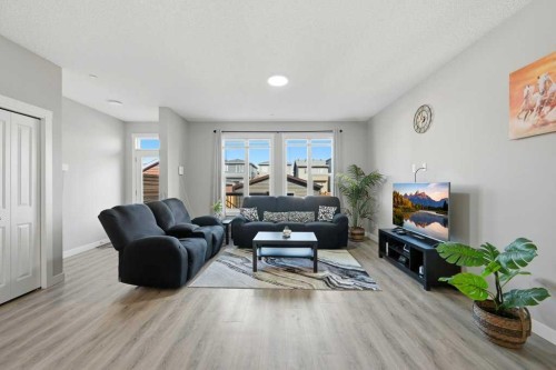 75 Howse Crescent Ne, Calgary, AB - Indoor Photo Showing Living Room