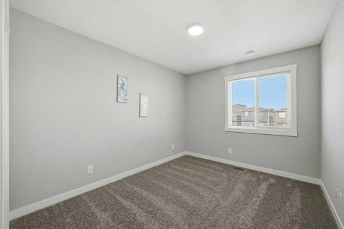 75 Howse Crescent Ne, Calgary, AB - Indoor Photo Showing Other Room