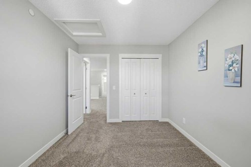 75 Howse Crescent Ne, Calgary, AB - Indoor Photo Showing Other Room