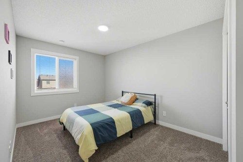 75 Howse Crescent Ne, Calgary, AB - Indoor Photo Showing Bedroom