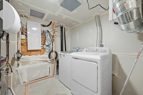 75 Howse Crescent Ne, Calgary, AB - Indoor Photo Showing Laundry Room