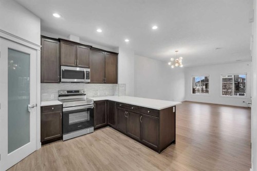 9 Redstone Common Ne, Calgary, AB - Indoor Photo Showing Kitchen With Upgraded Kitchen