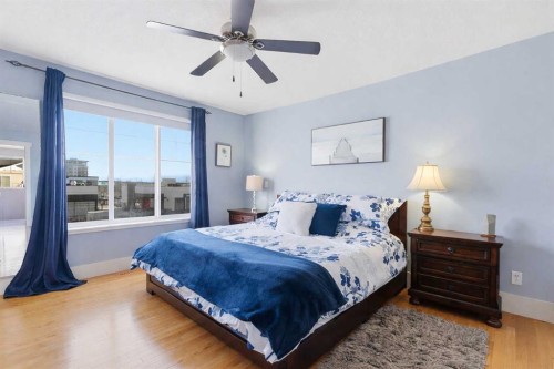 129 Cougartown Circle Sw, Calgary, AB - Indoor Photo Showing Bedroom