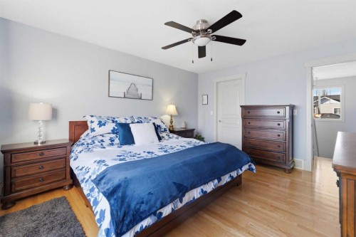 129 Cougartown Circle Sw, Calgary, AB - Indoor Photo Showing Bedroom