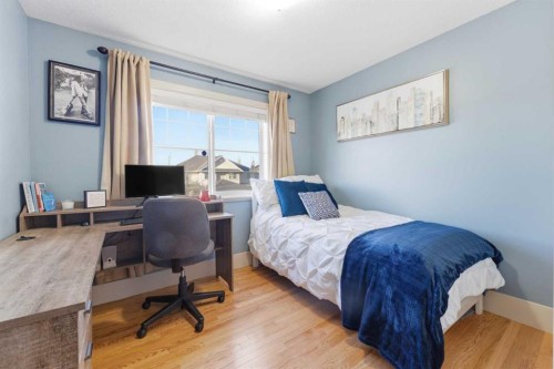 129 Cougartown Circle Sw, Calgary, AB - Indoor Photo Showing Bedroom