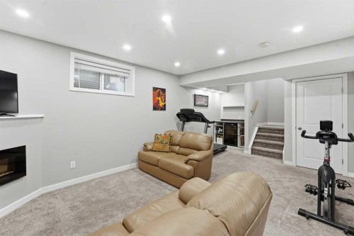 129 Cougartown Circle Sw, Calgary, AB - Indoor Photo Showing Basement