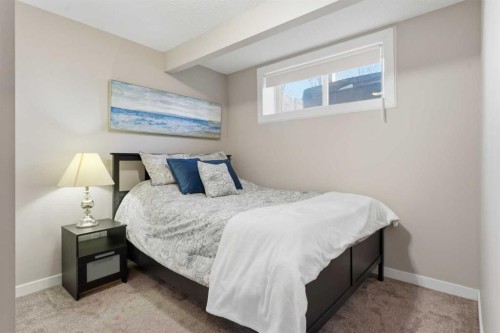 129 Cougartown Circle Sw, Calgary, AB - Indoor Photo Showing Bedroom