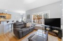 129 Cougartown Circle Sw, Calgary, AB  - Indoor Photo Showing Living Room 