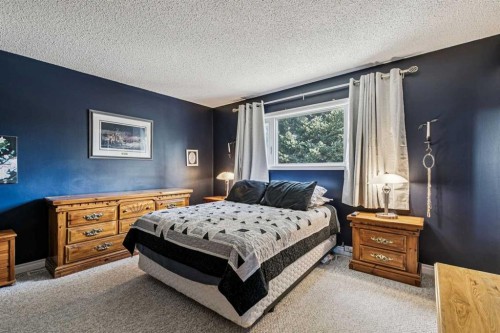 443 Brookmere Crescent Sw, Calgary, AB - Indoor Photo Showing Bedroom