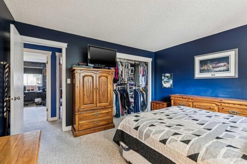 443 Brookmere Crescent Sw, Calgary, AB - Indoor Photo Showing Bedroom