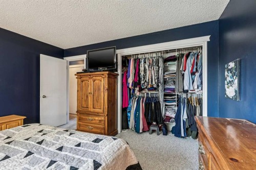 443 Brookmere Crescent Sw, Calgary, AB - Indoor Photo Showing Bedroom