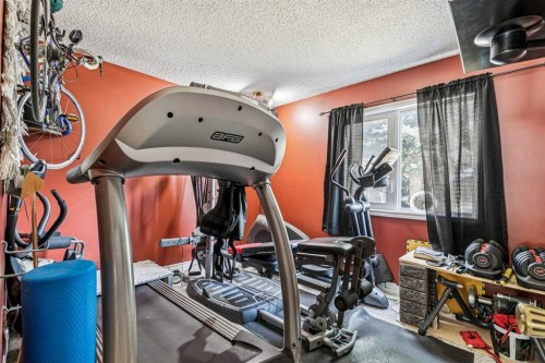 443 Brookmere Crescent Sw, Calgary, AB - Indoor Photo Showing Gym Room