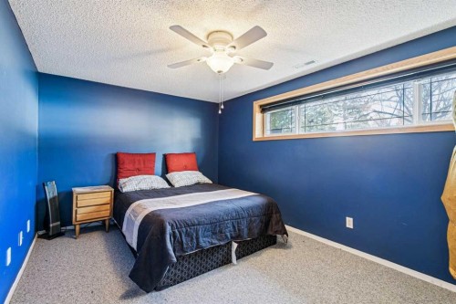 443 Brookmere Crescent Sw, Calgary, AB - Indoor Photo Showing Bedroom