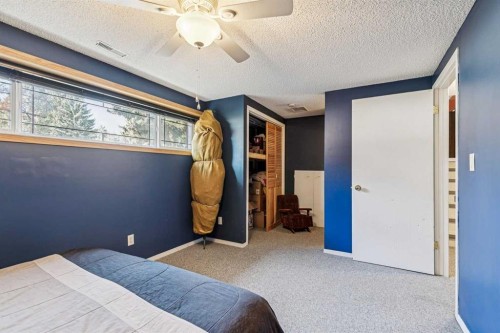 443 Brookmere Crescent Sw, Calgary, AB - Indoor Photo Showing Bedroom