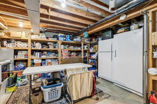 443 Brookmere Crescent Sw, Calgary, AB - Indoor Photo Showing Basement