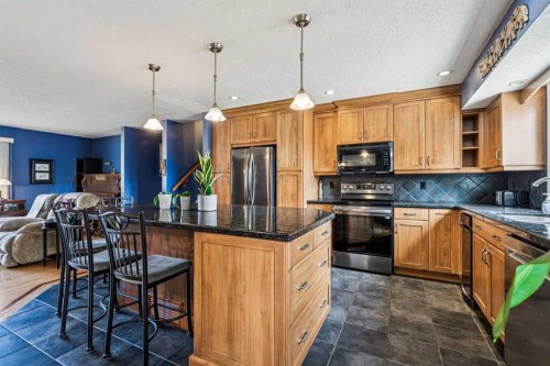 443 Brookmere Crescent Sw, Calgary, AB - Indoor Photo Showing Kitchen With Stainless Steel Kitchen