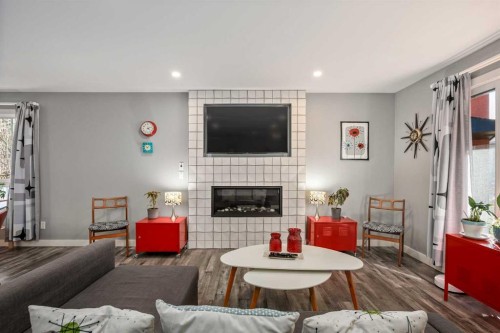 224 Cedarbrae Crescent Sw, Calgary, AB - Indoor Photo Showing Living Room With Fireplace